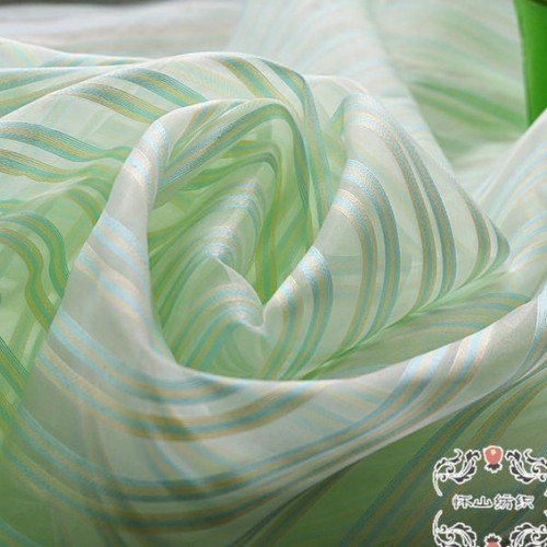 現(xiàn)貨2015爆款  歐根紗提花裙面料 網(wǎng)條服裝面料 條紋布