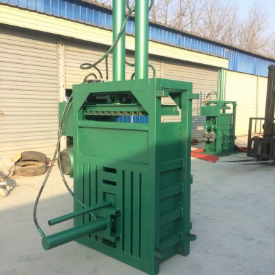 半自動廢布料打包機 海綿邊角料立式壓塊機 無紡布廢料回收擠包機廠家