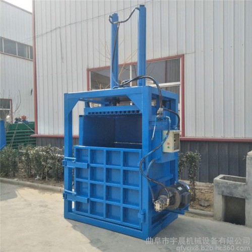 大棚油紙壓縮打塊機   半自動絲綢無紡布打包機   液壓布條壓縮打包機**